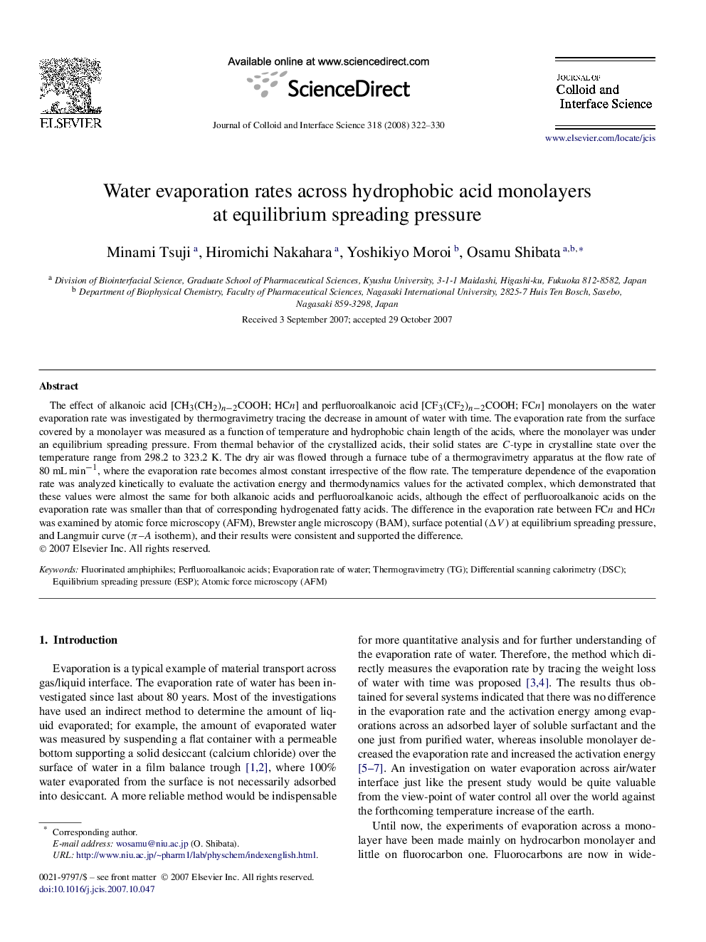 Water evaporation rates across hydrophobic acid monolayers at equilibrium spreading pressure