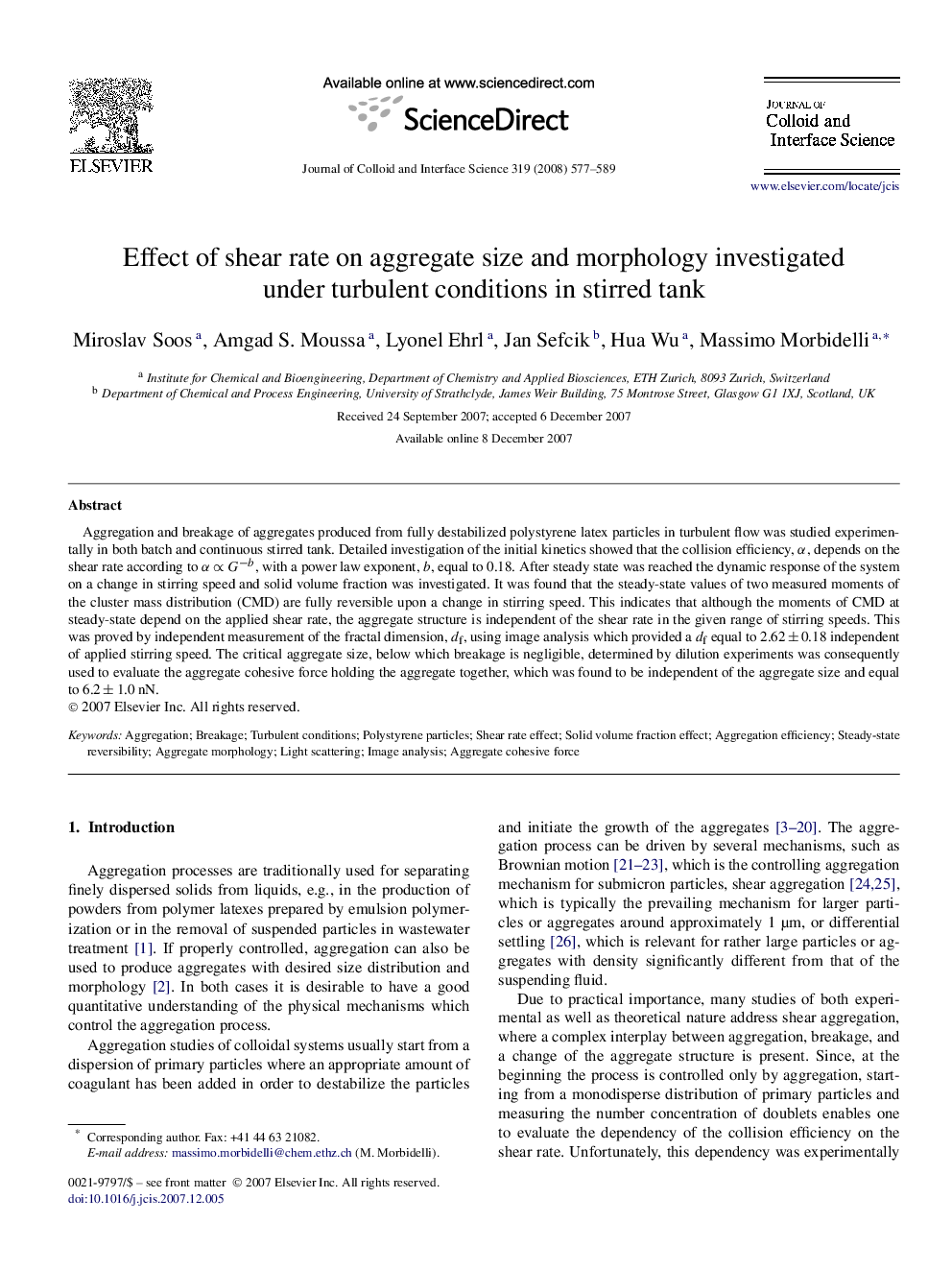 Effect of shear rate on aggregate size and morphology investigated under turbulent conditions in stirred tank