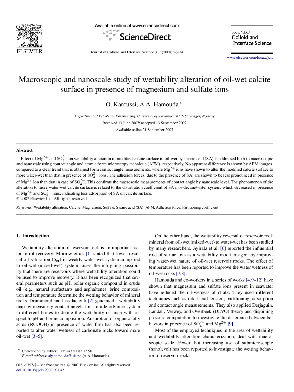 Macroscopic and nanoscale study of wettability alteration of oil-wet calcite surface in presence of magnesium and sulfate ions