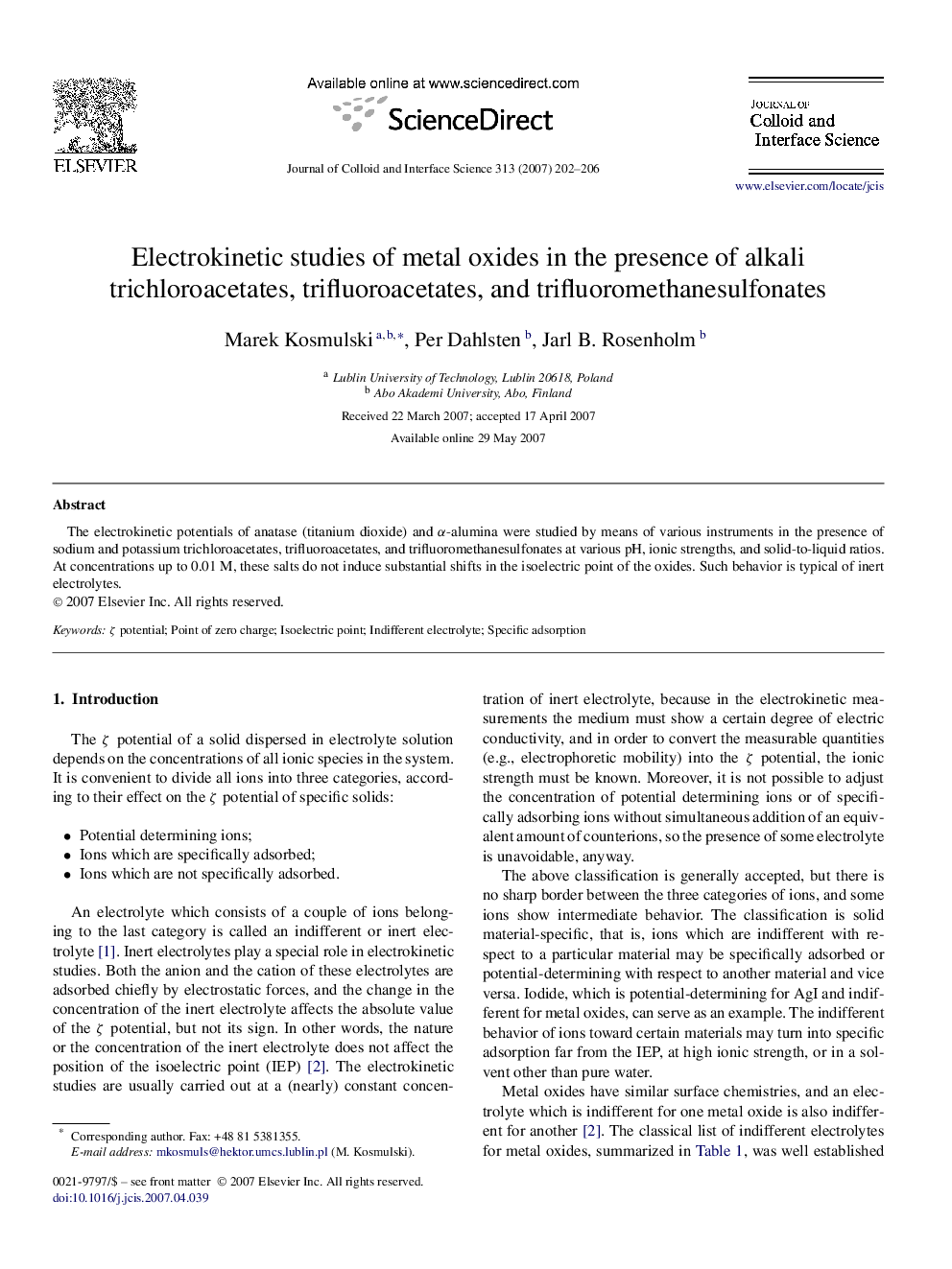 Electrokinetic studies of metal oxides in the presence of alkali trichloroacetates, trifluoroacetates, and trifluoromethanesulfonates