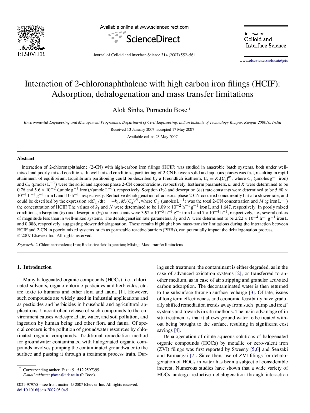 Interaction of 2-chloronaphthalene with high carbon iron filings (HCIF): Adsorption, dehalogenation and mass transfer limitations