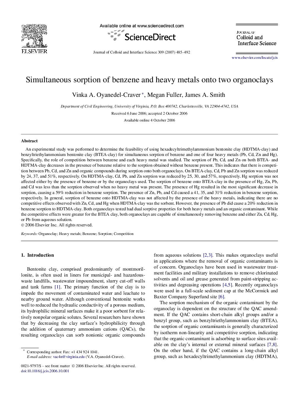 Simultaneous sorption of benzene and heavy metals onto two organoclays