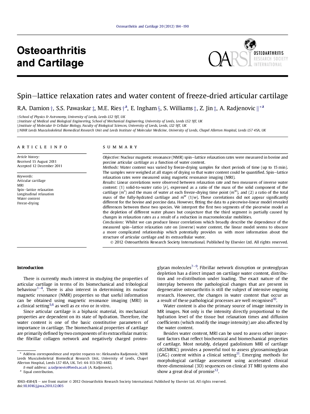 Spin-lattice relaxation rates and water content of freeze-dried articular cartilage