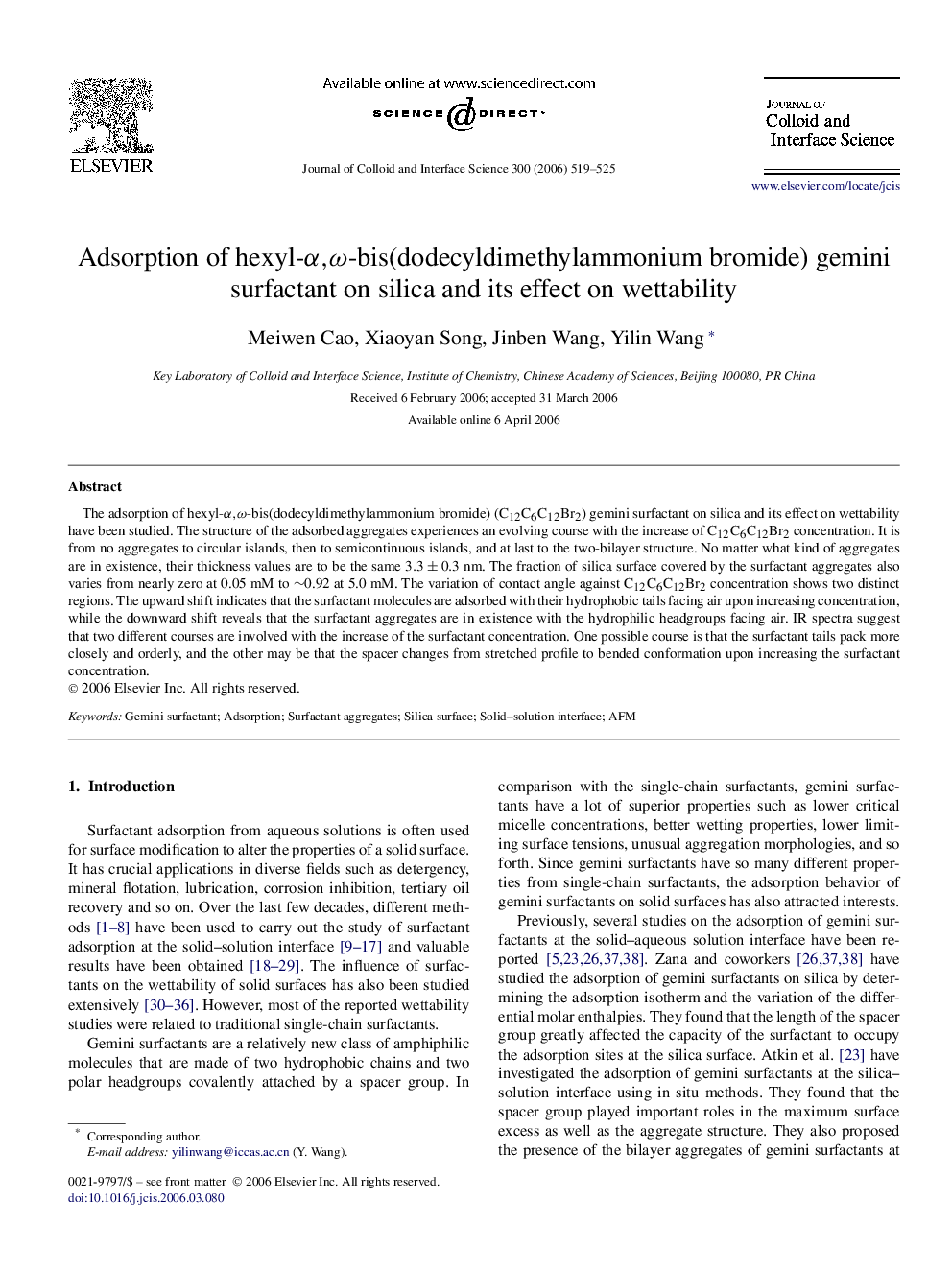 Adsorption of hexyl-α,ωα,ω-bis(dodecyldimethylammonium bromide) gemini surfactant on silica and its effect on wettability