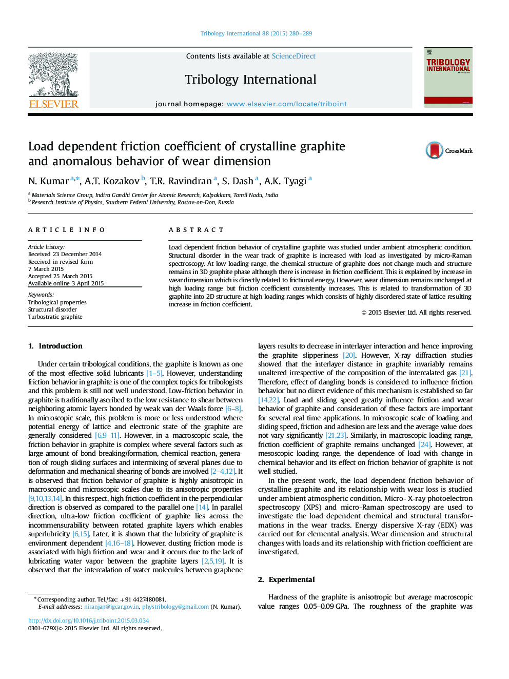 Load dependent friction coefficient of crystalline graphite and anomalous behavior of wear dimension