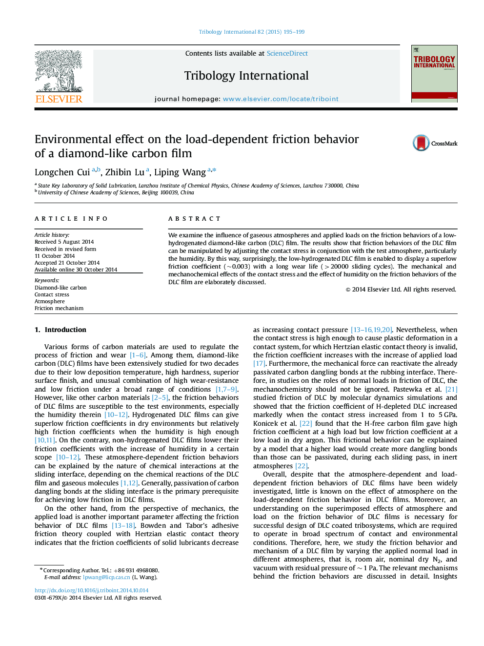 Environmental effect on the load-dependent friction behavior of a diamond-like carbon film