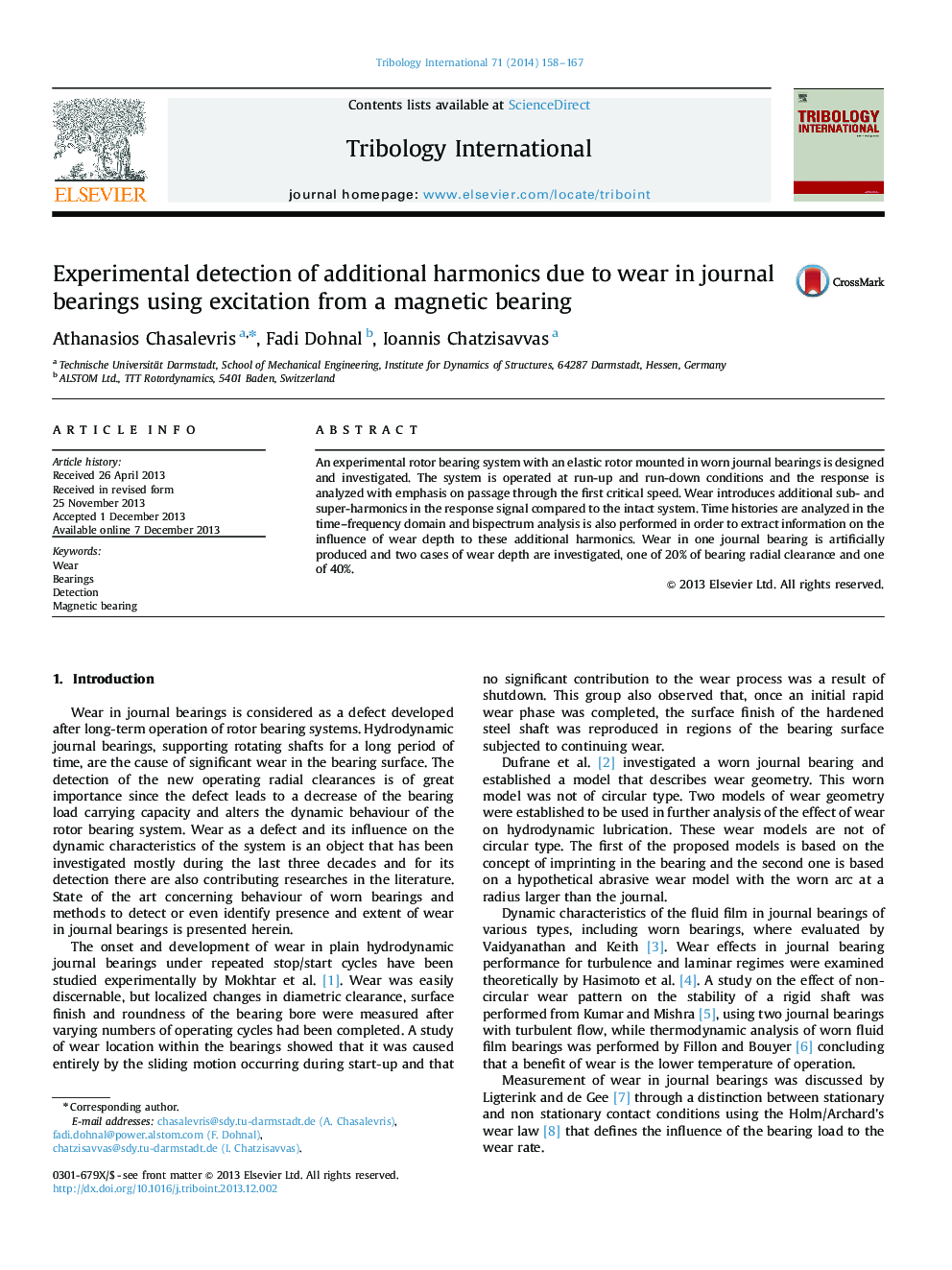 Experimental detection of additional harmonics due to wear in journal bearings using excitation from a magnetic bearing