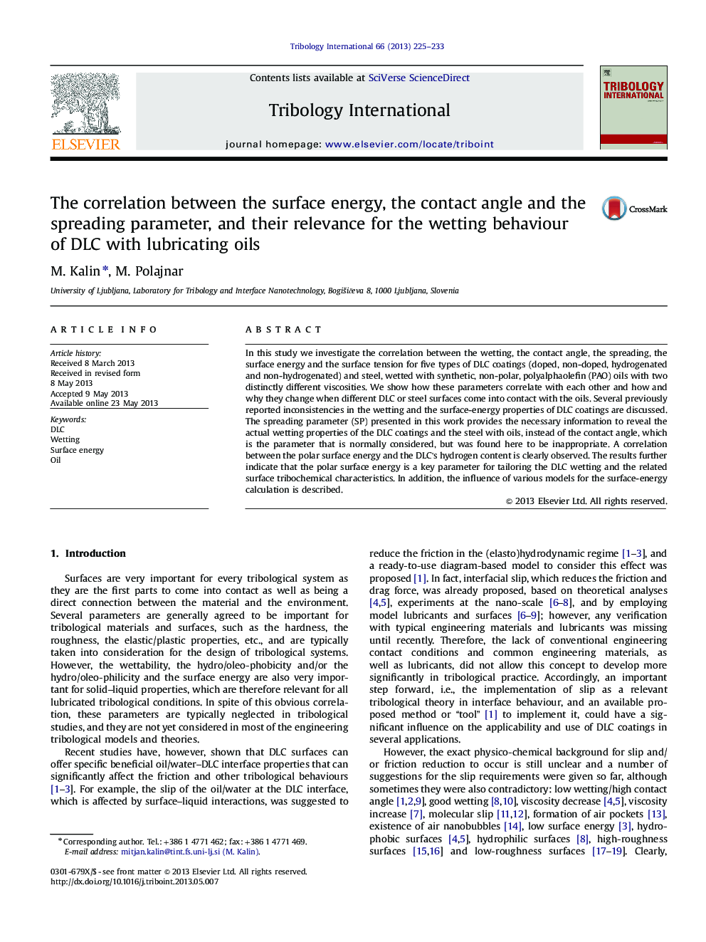 The correlation between the surface energy, the contact angle and the spreading parameter, and their relevance for the wetting behaviour of DLC with lubricating oils