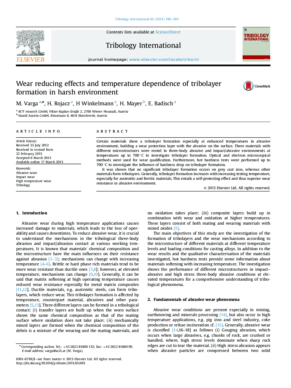 Wear reducing effects and temperature dependence of tribolayer formation in harsh environment