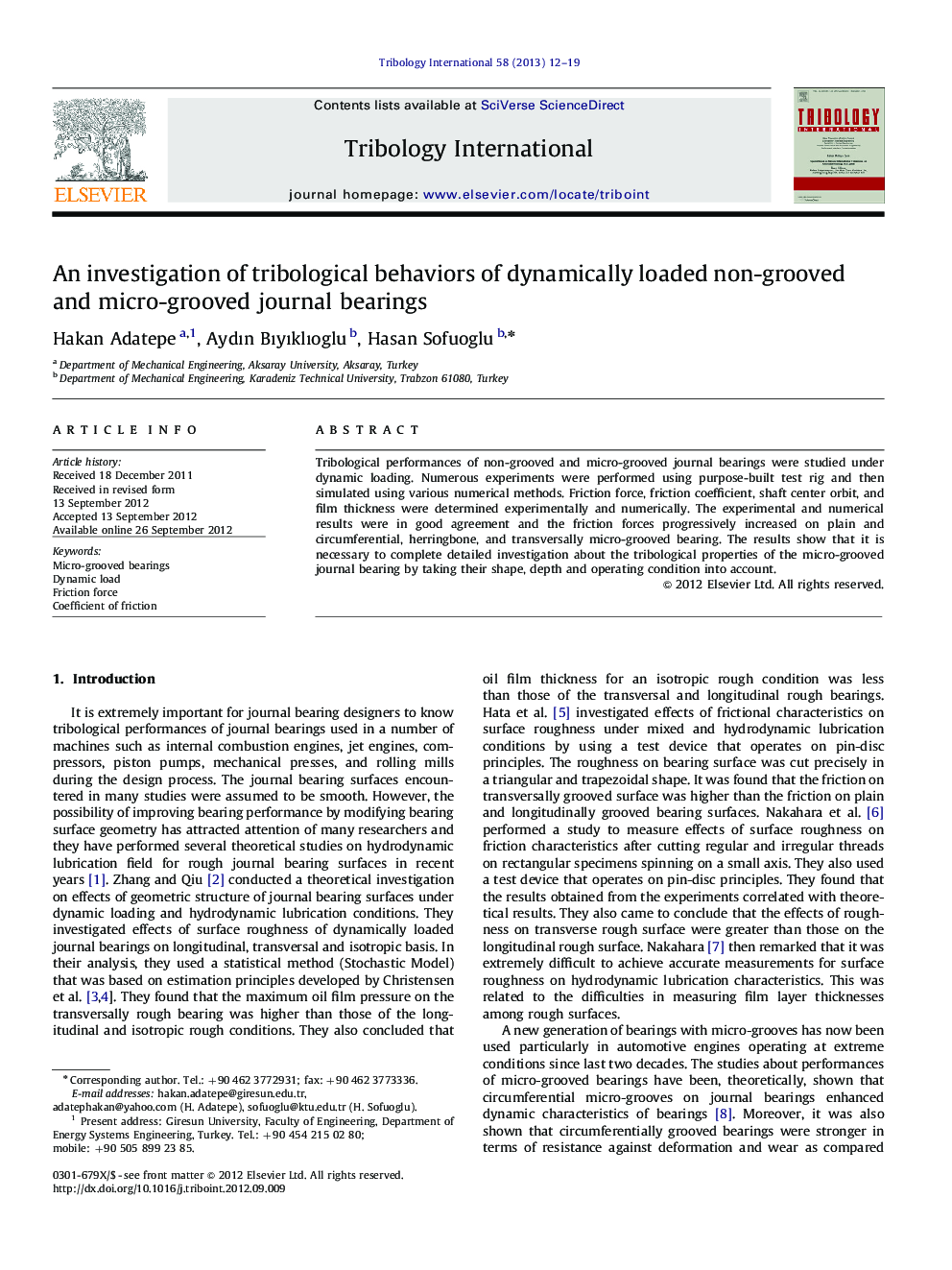 An investigation of tribological behaviors of dynamically loaded non-grooved and micro-grooved journal bearings