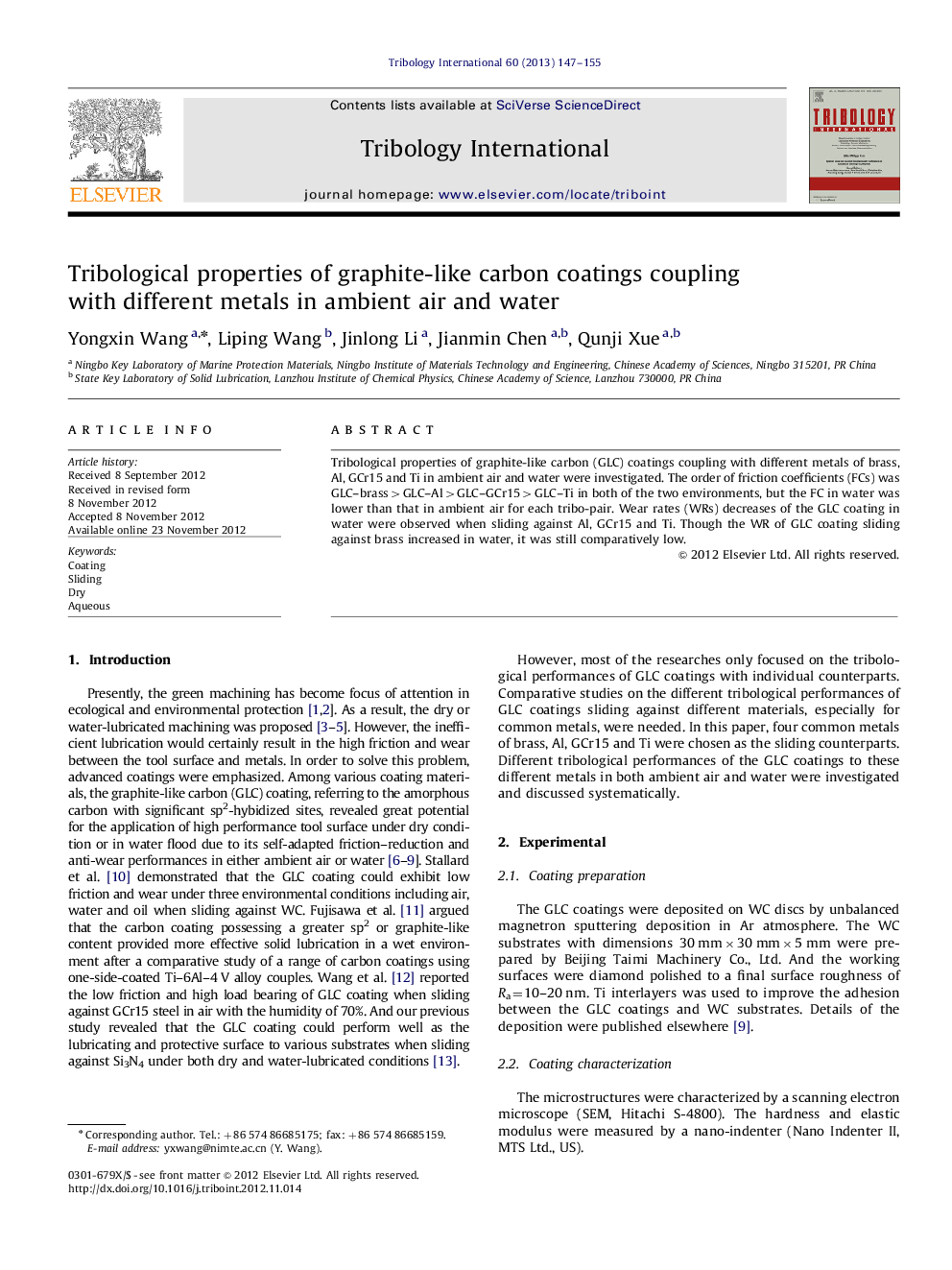 Tribological properties of graphite-like carbon coatings coupling with different metals in ambient air and water