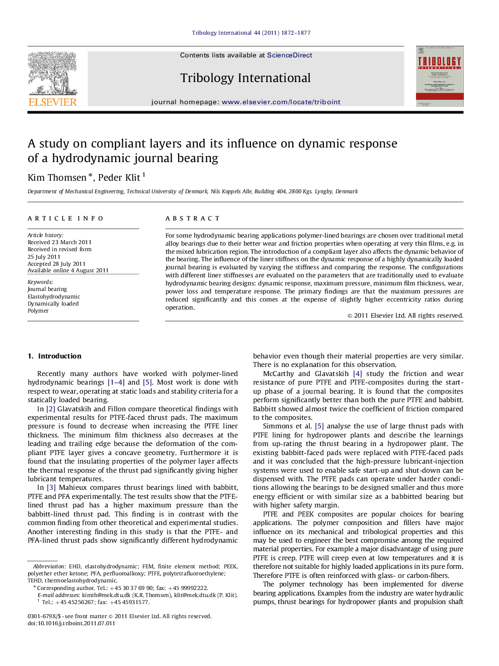 A study on compliant layers and its influence on dynamic response of a hydrodynamic journal bearing