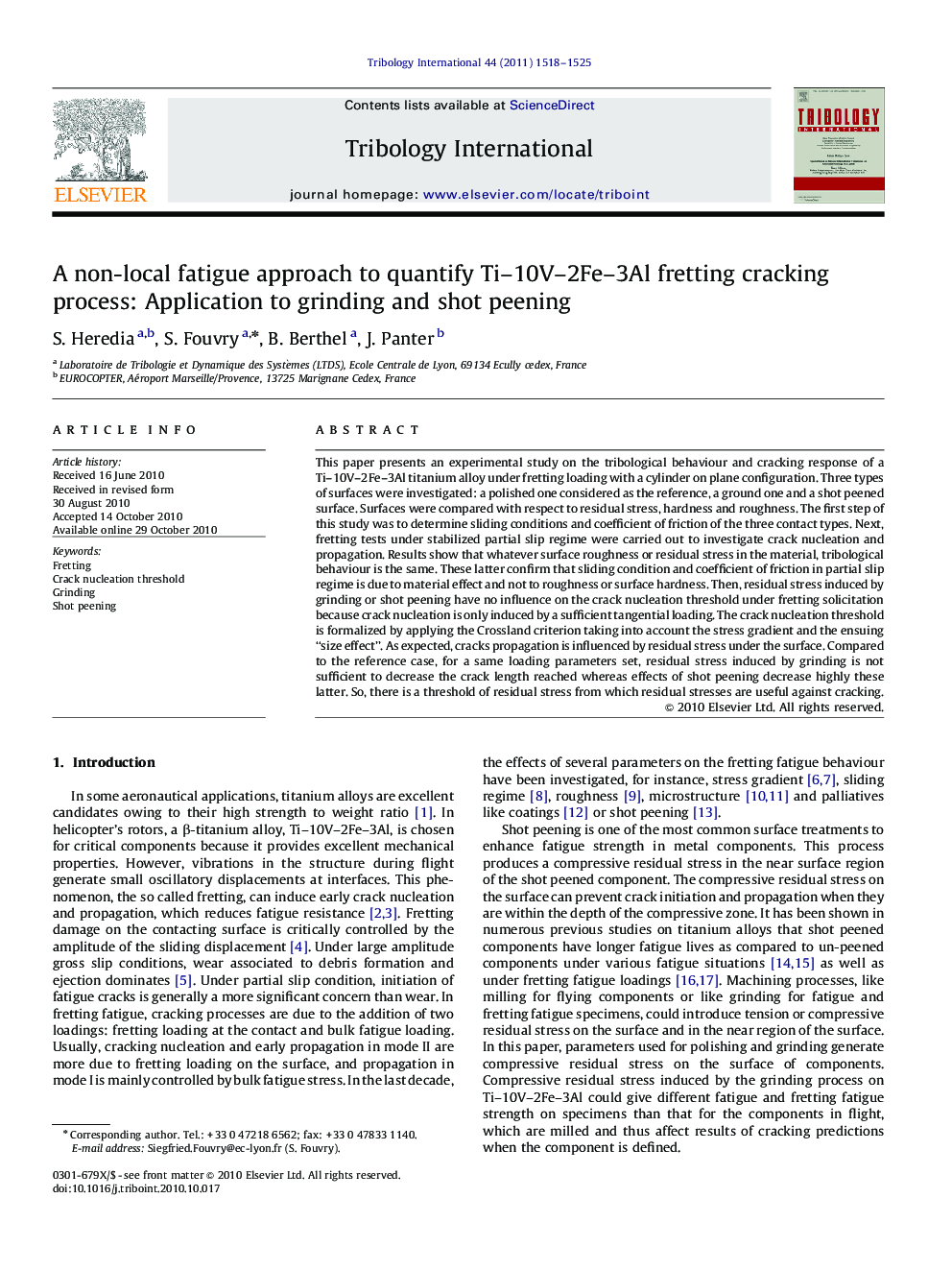 A non-local fatigue approach to quantify Ti–10V–2Fe–3Al fretting cracking process: Application to grinding and shot peening