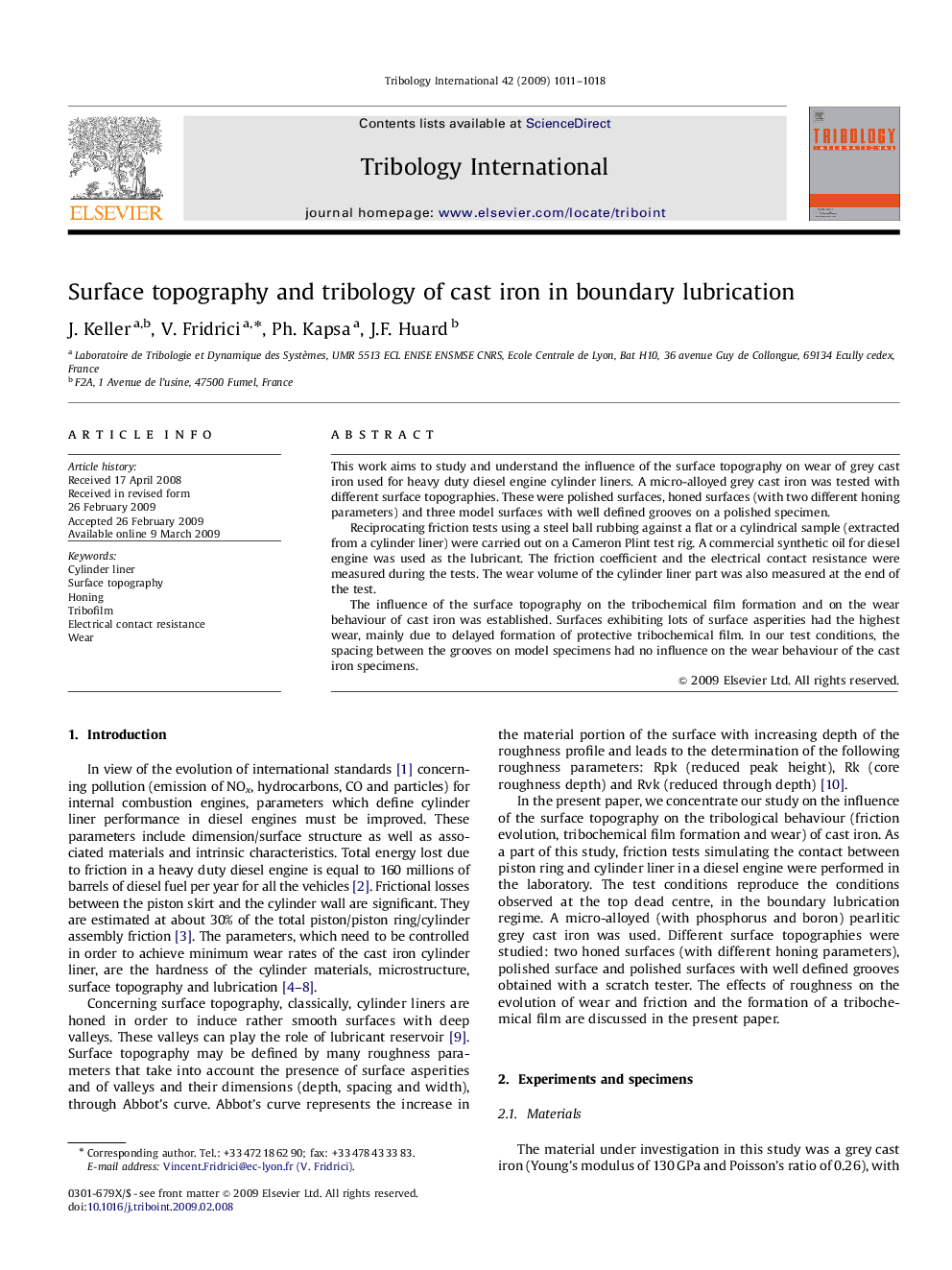 Surface topography and tribology of cast iron in boundary lubrication