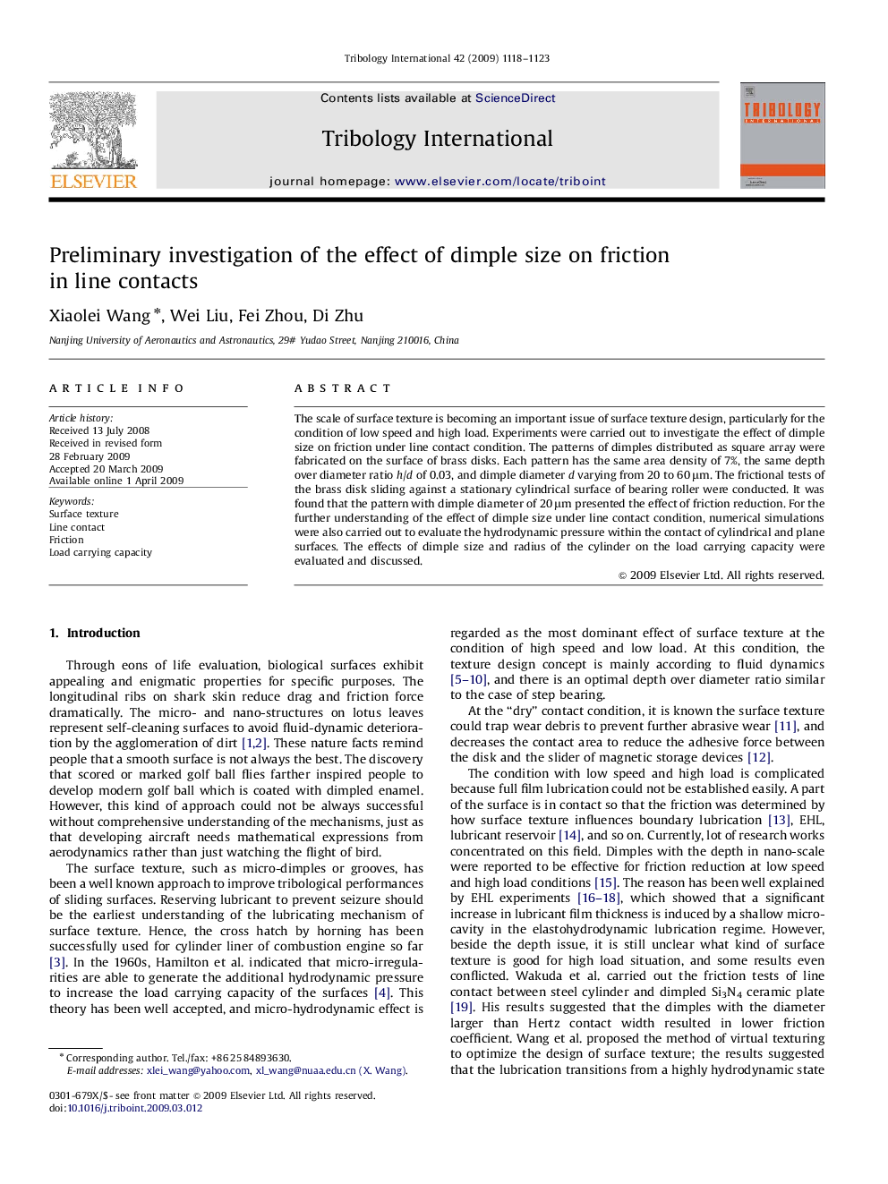 Preliminary investigation of the effect of dimple size on friction in line contacts