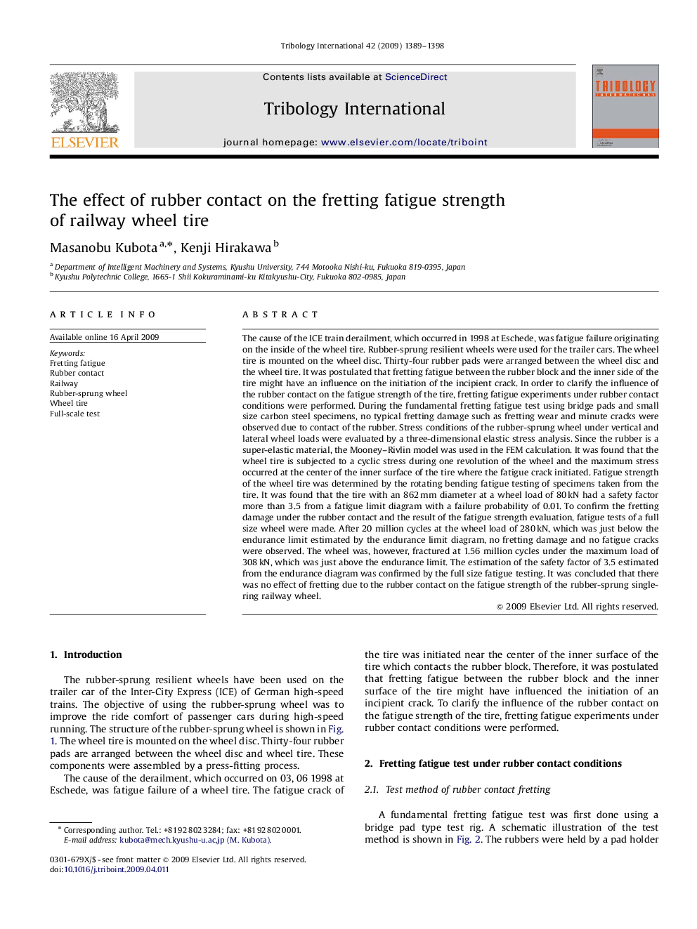 The effect of rubber contact on the fretting fatigue strength of railway wheel tire