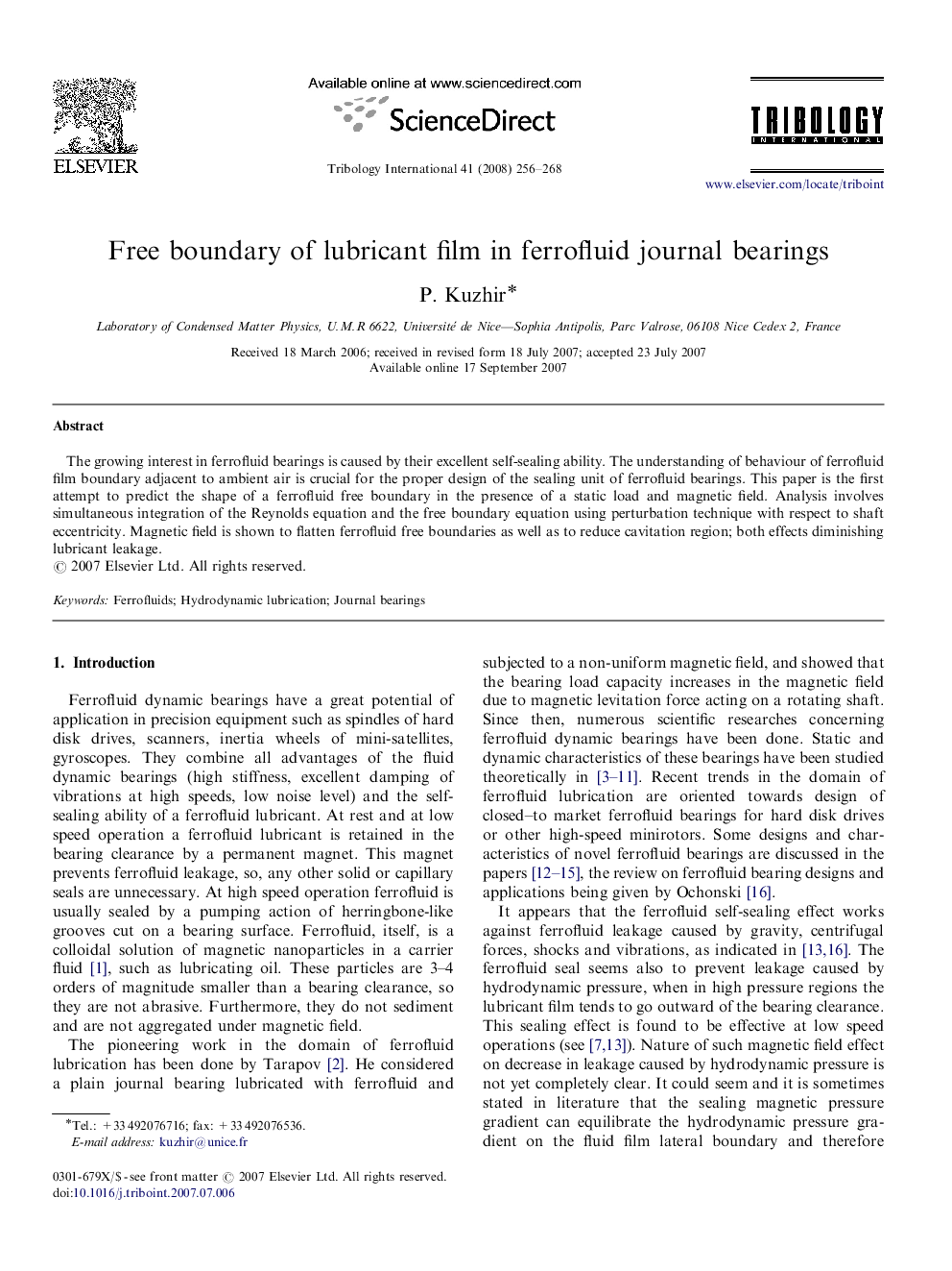 Free boundary of lubricant film in ferrofluid journal bearings