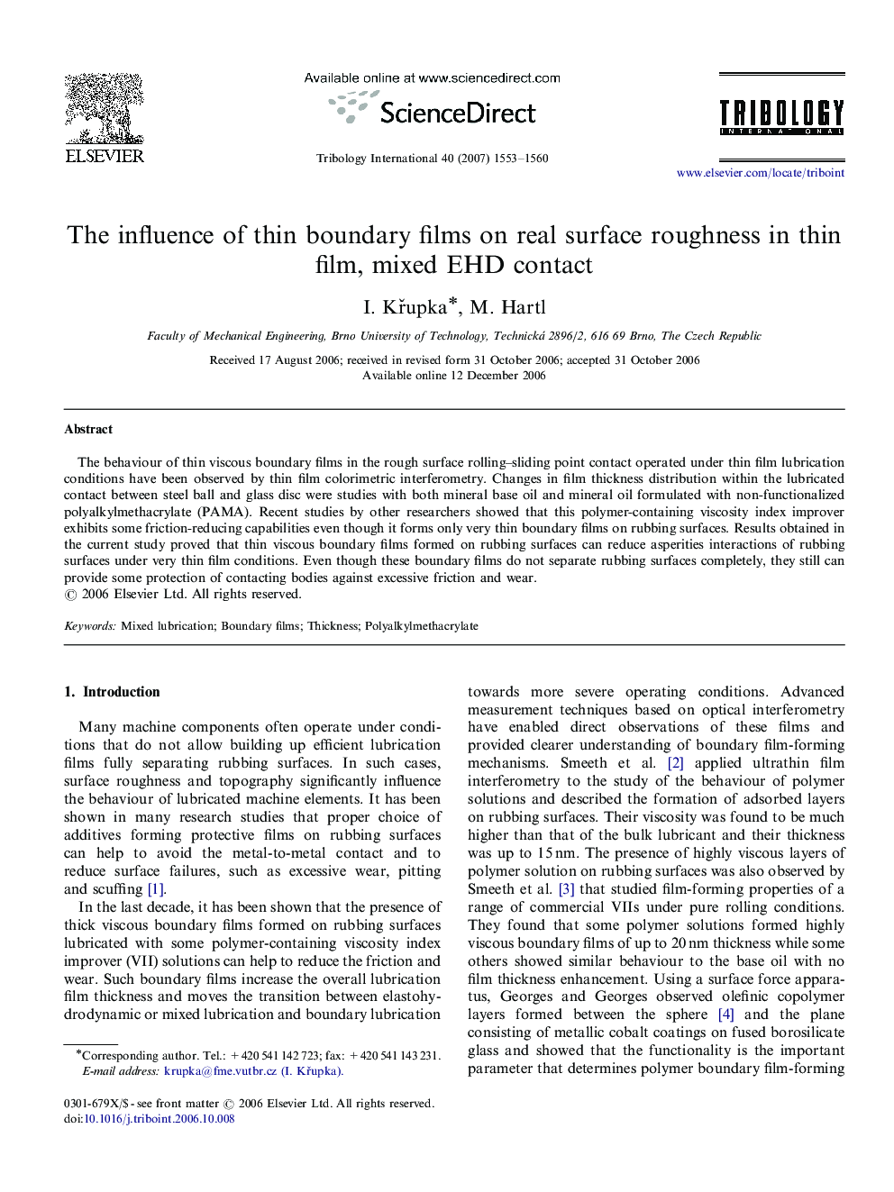 The influence of thin boundary films on real surface roughness in thin film, mixed EHD contact