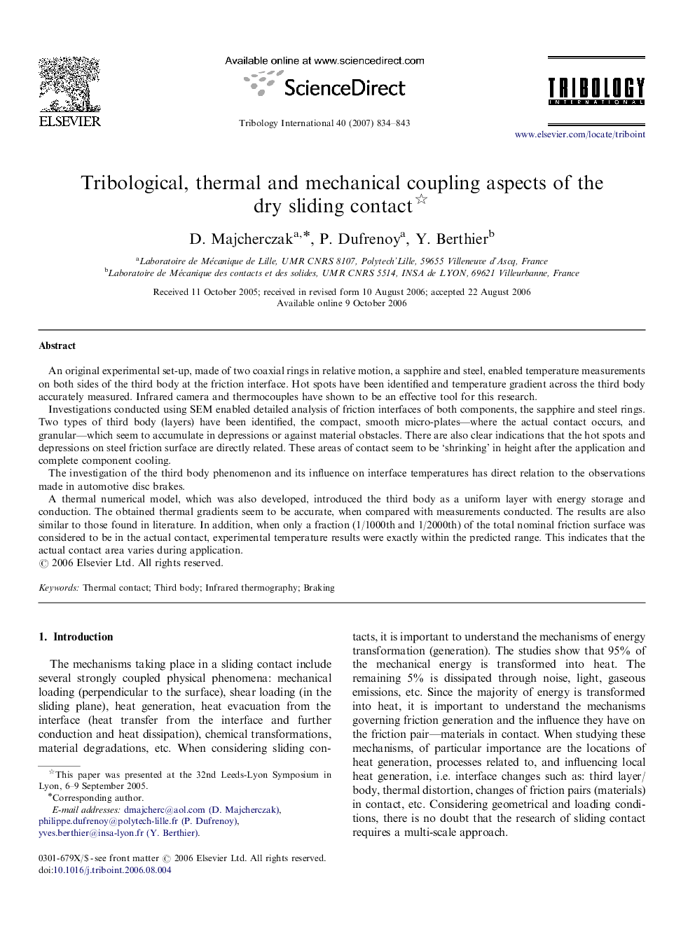 Tribological, thermal and mechanical coupling aspects of the dry sliding contact 