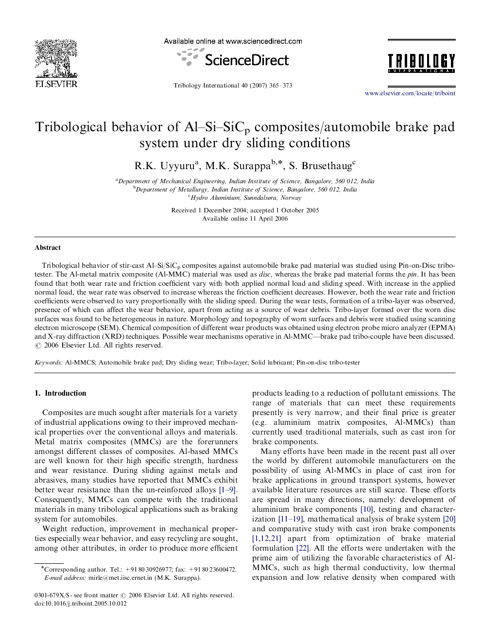 Tribological behavior of Al–Si–SiCp composites/automobile brake pad system under dry sliding conditions