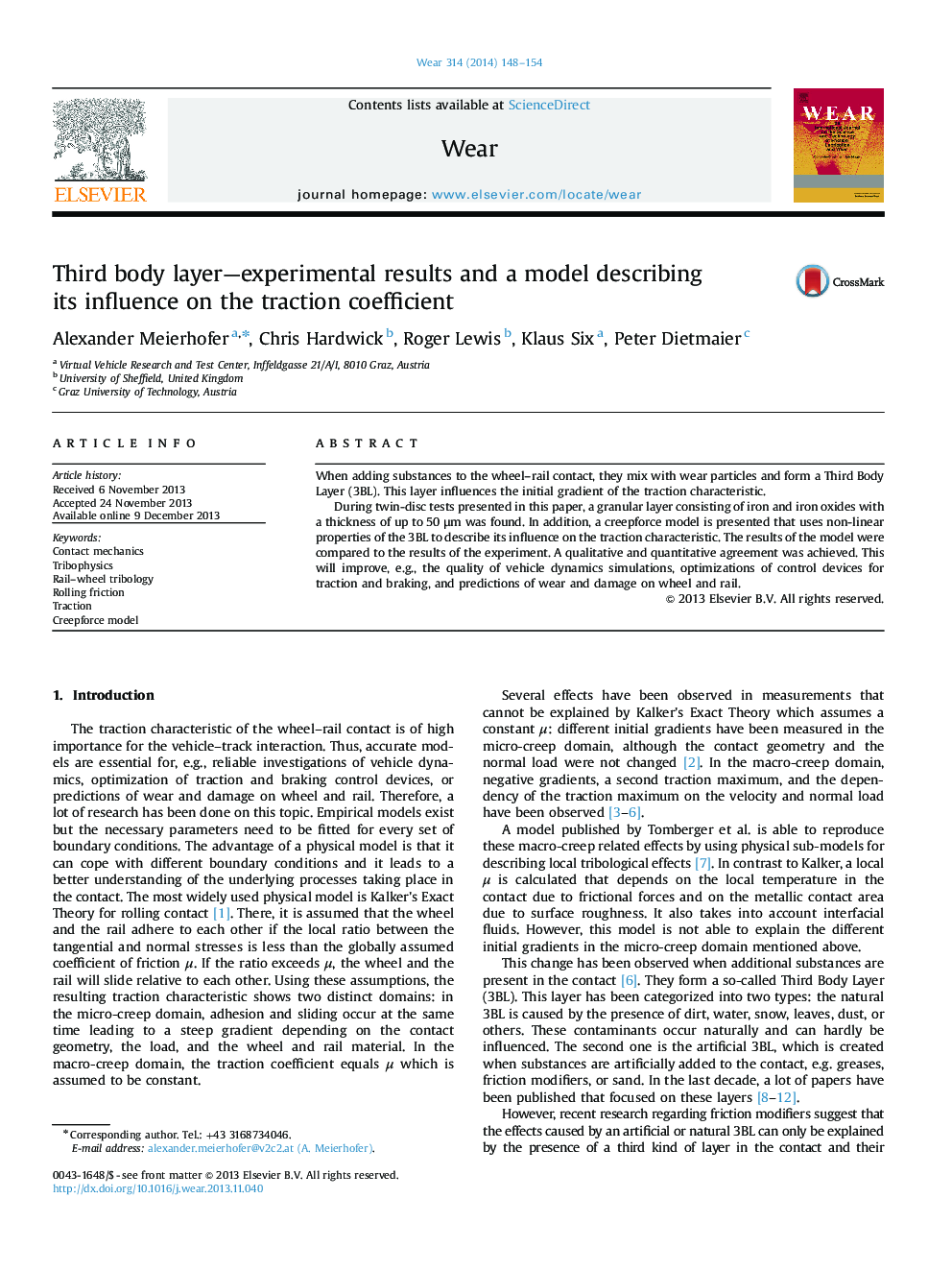 Third body layer—experimental results and a model describing its influence on the traction coefficient