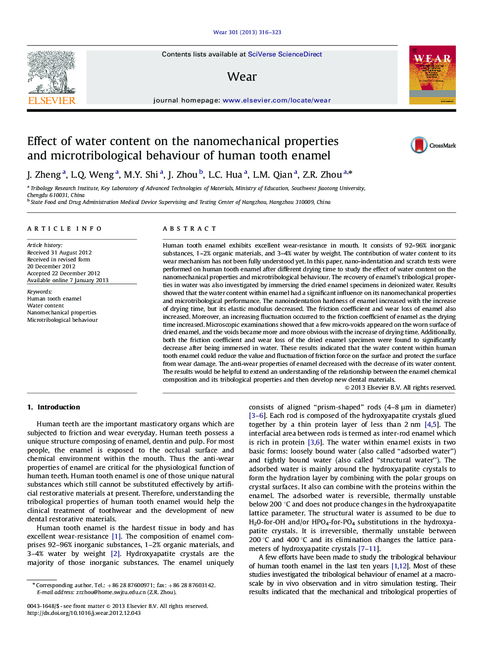 Effect of water content on the nanomechanical properties and microtribological behaviour of human tooth enamel