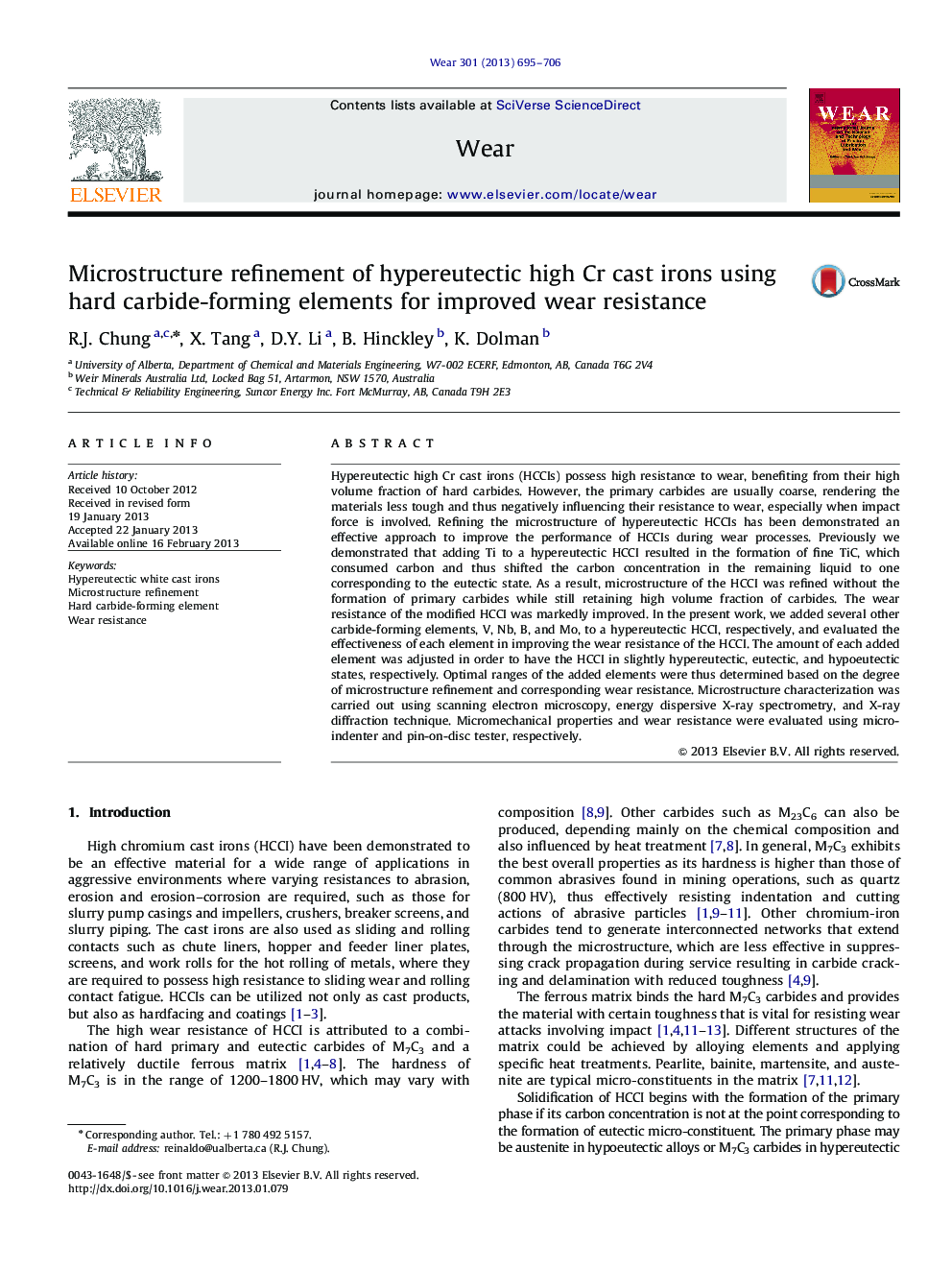 Microstructure refinement of hypereutectic high Cr cast irons using hard carbide-forming elements for improved wear resistance