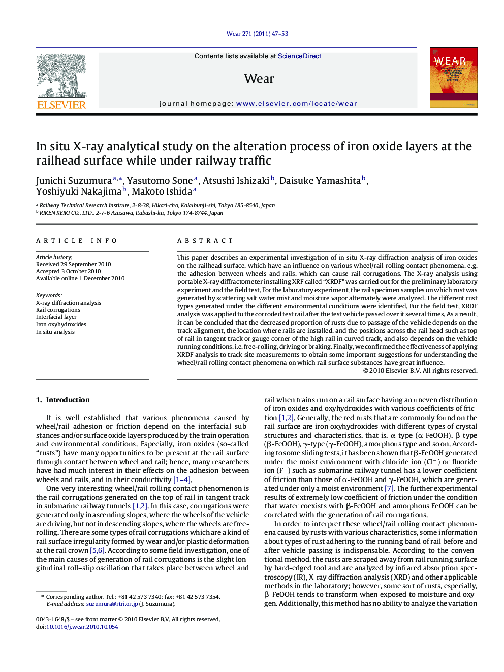 In situ X-ray analytical study on the alteration process of iron oxide layers at the railhead surface while under railway traffic