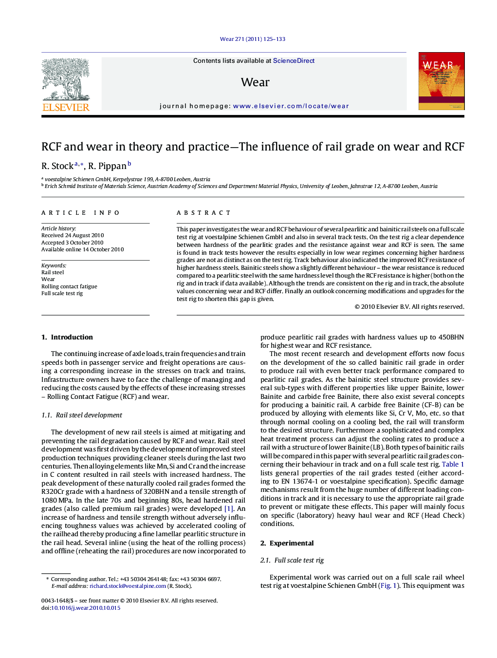 RCF and wear in theory and practice-The influence of rail grade on wear and RCF