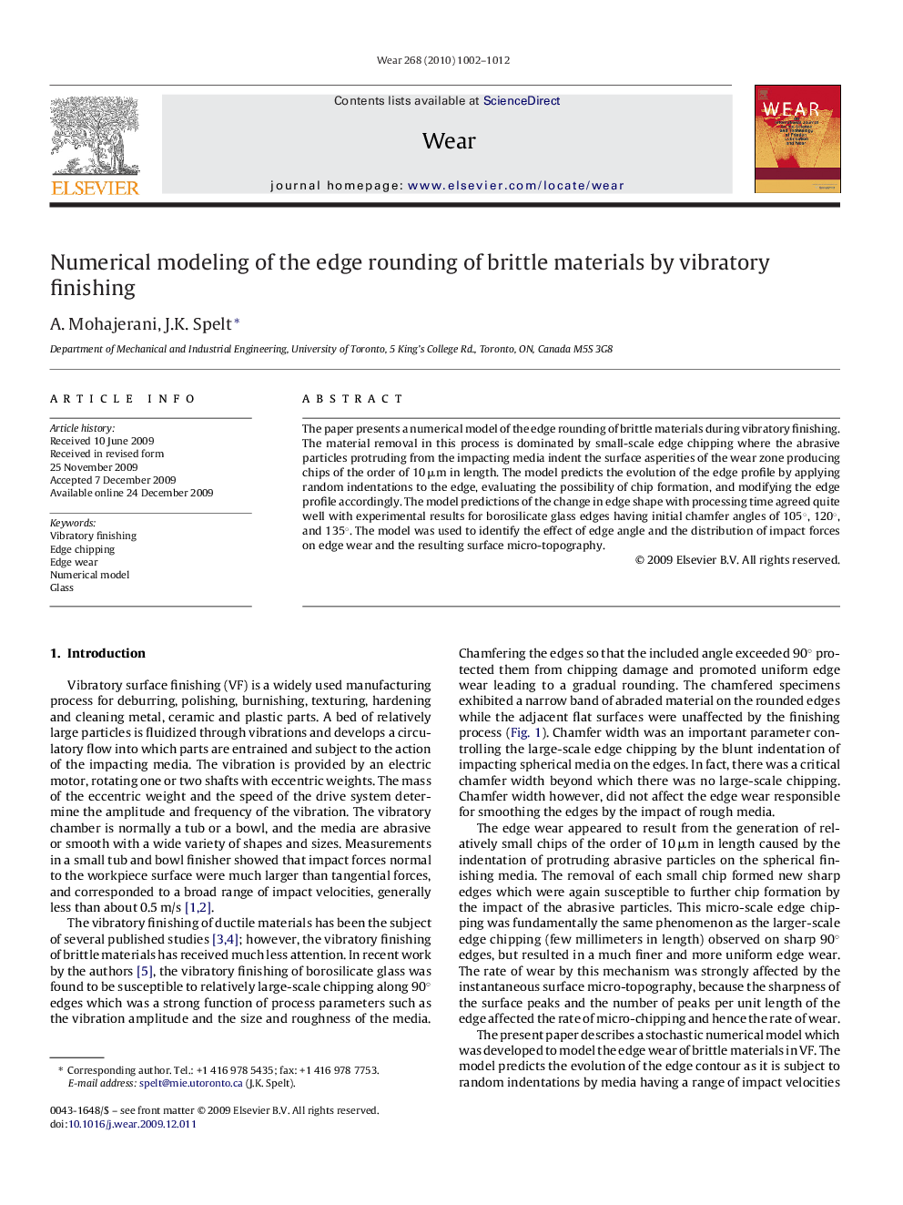 Numerical modeling of the edge rounding of brittle materials by vibratory finishing