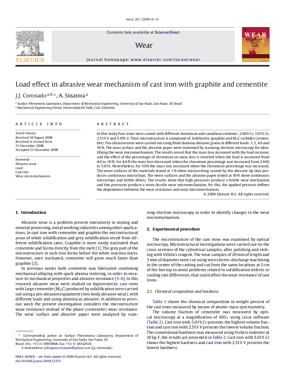 Load effect in abrasive wear mechanism of cast iron with graphite and cementite