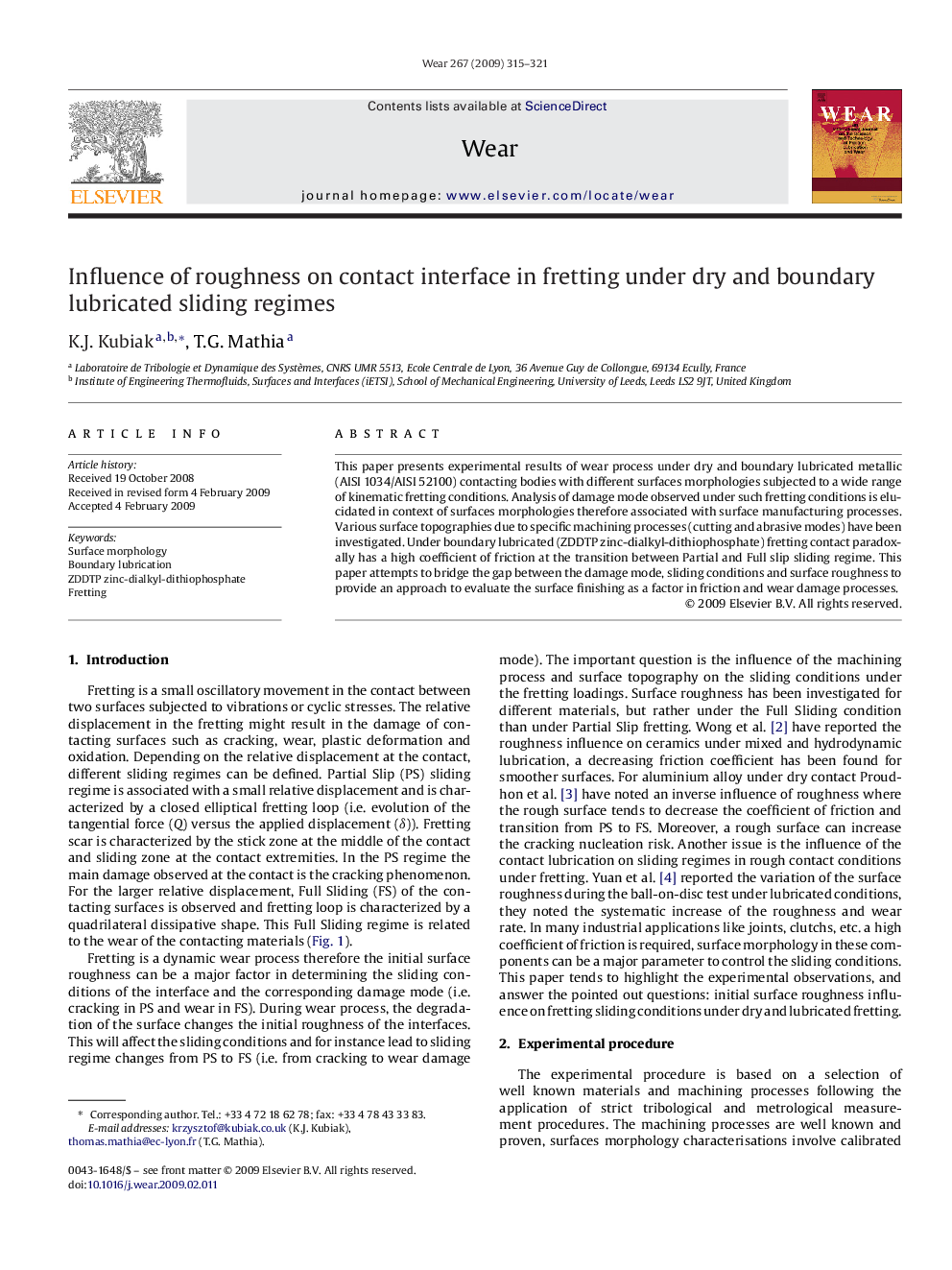 Influence of roughness on contact interface in fretting under dry and boundary lubricated sliding regimes