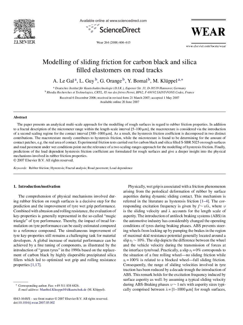 Modelling of sliding friction for carbon black and silica filled elastomers on road tracks