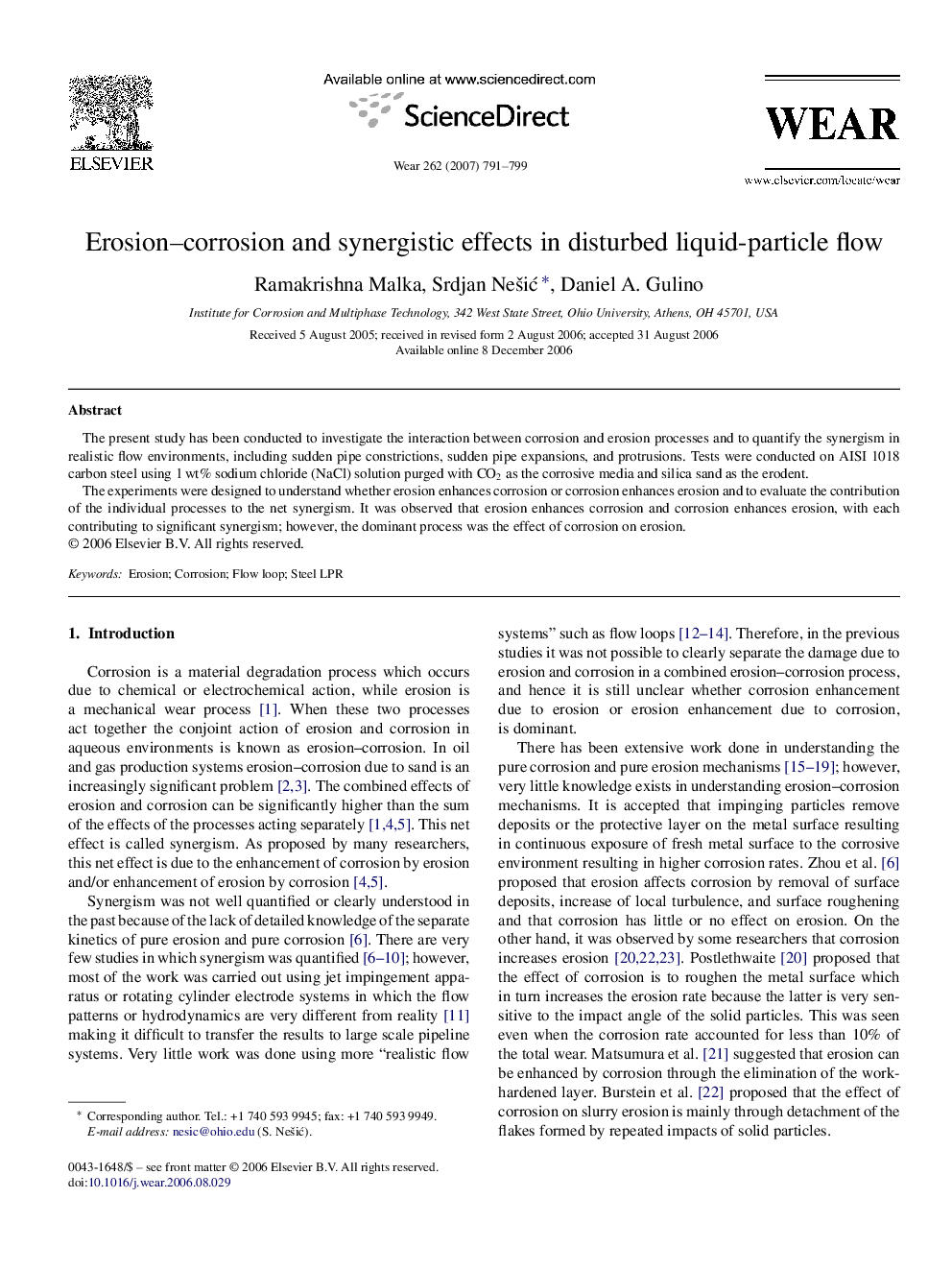 Erosion-corrosion and synergistic effects in disturbed liquid-particle flow