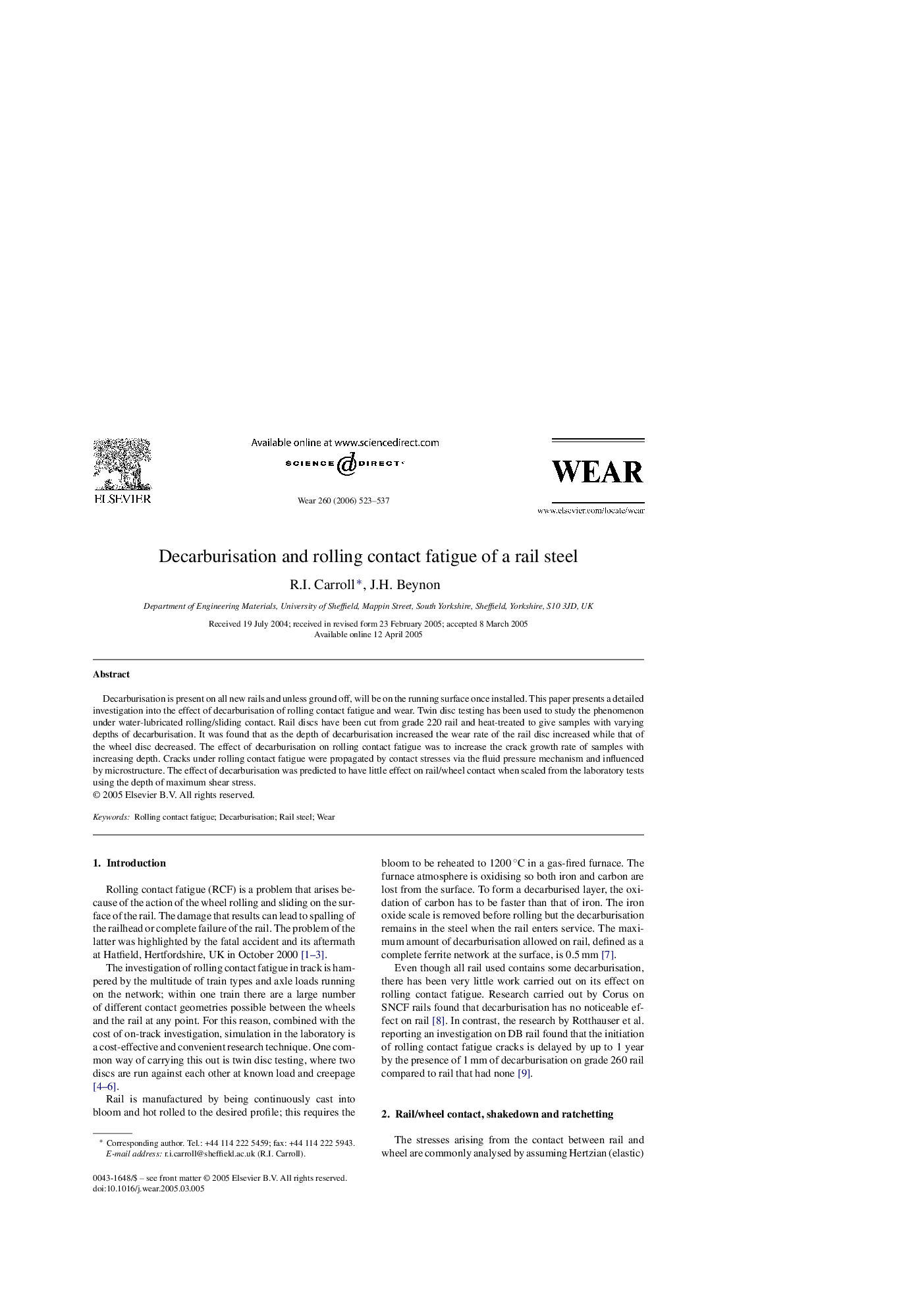 Decarburisation and rolling contact fatigue of a rail steel