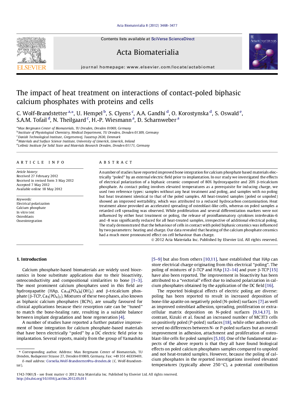 The impact of heat treatment on interactions of contact-poled biphasic calcium phosphates with proteins and cells