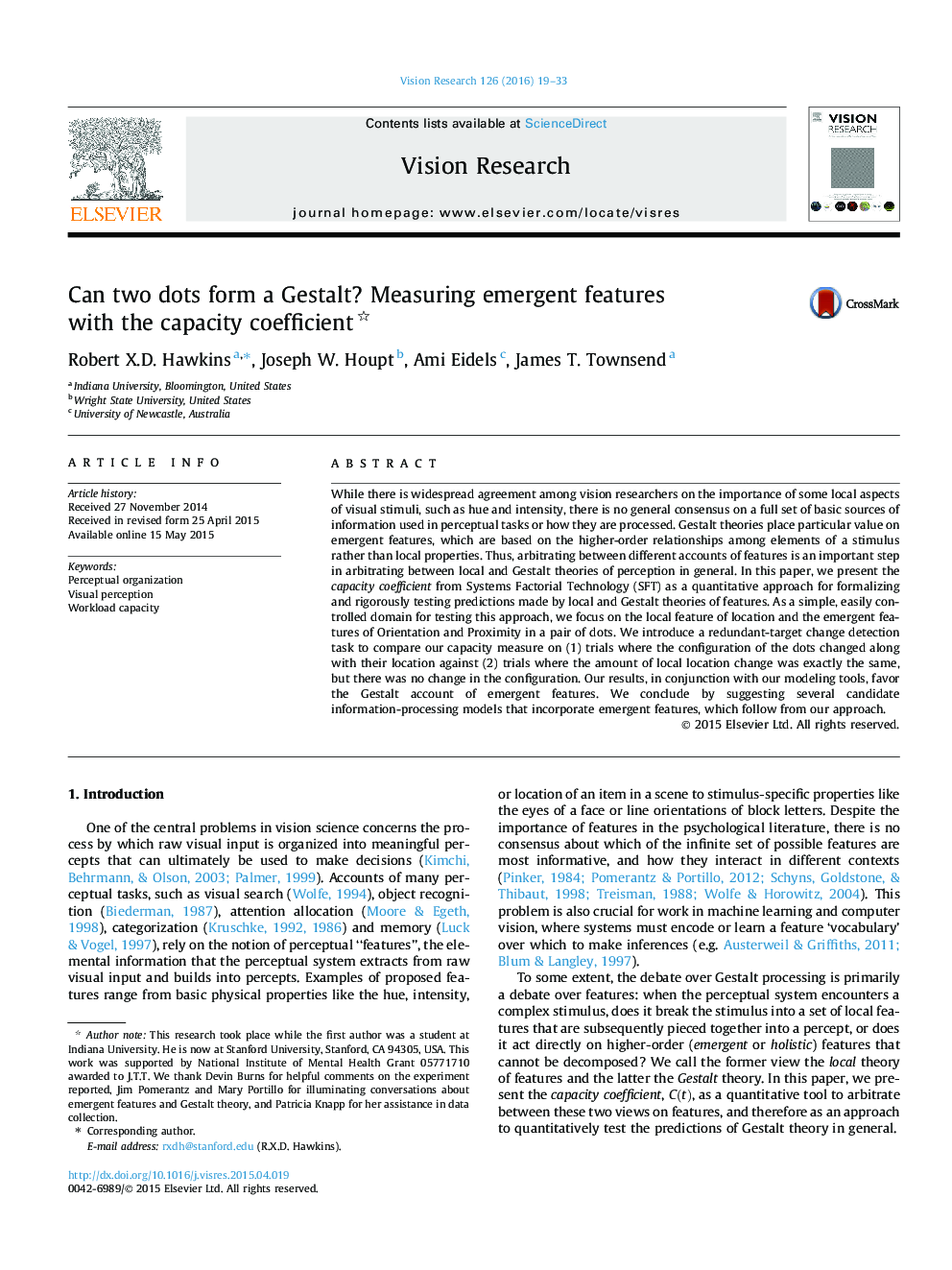 Can two dots form a Gestalt? Measuring emergent features with the capacity coefficient