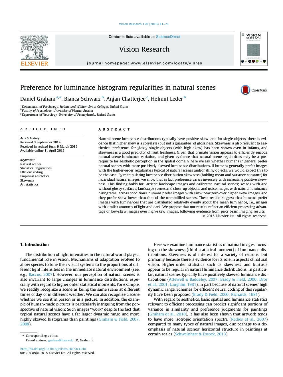 Preference for luminance histogram regularities in natural scenes