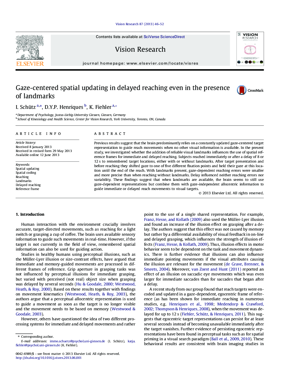 Gaze-centered spatial updating in delayed reaching even in the presence of landmarks