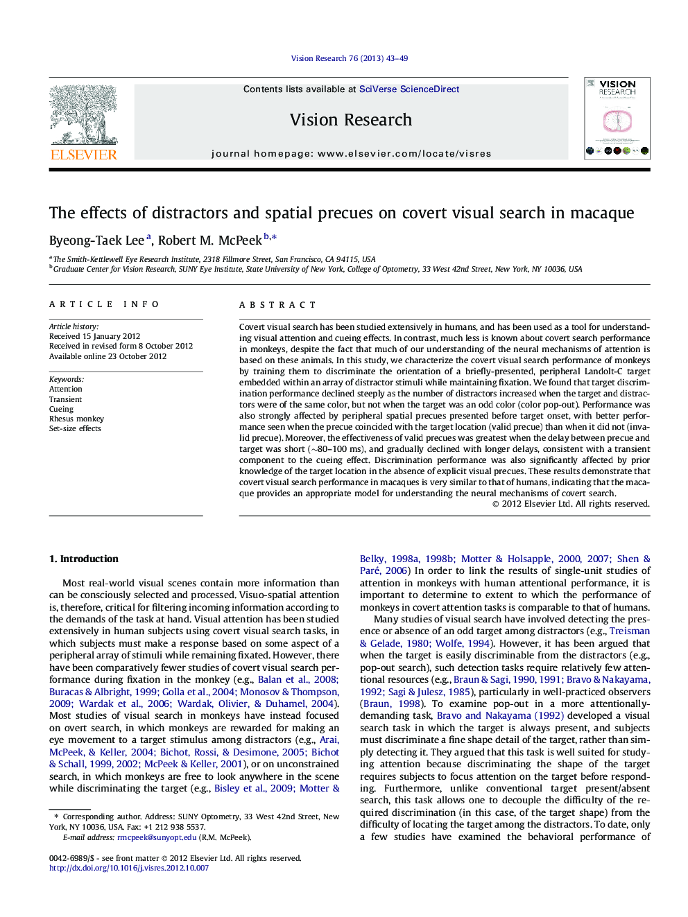 The effects of distractors and spatial precues on covert visual search in macaque