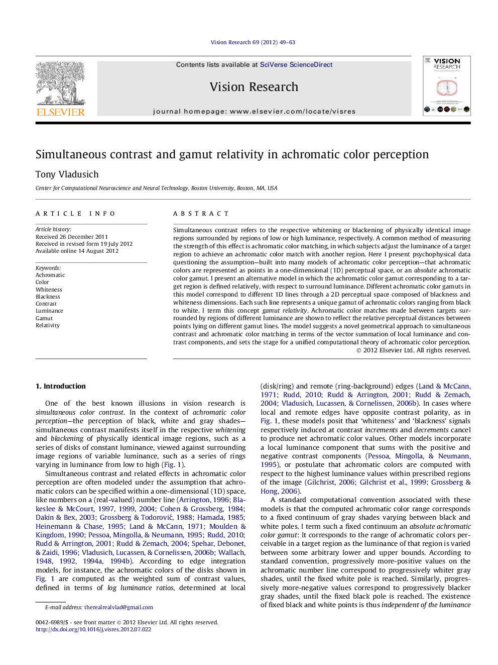 Simultaneous contrast and gamut relativity in achromatic color perception