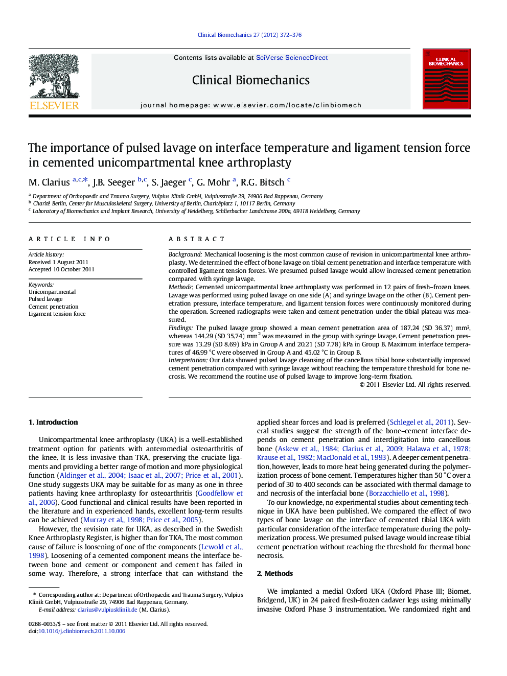 The importance of pulsed lavage on interface temperature and ligament tension force in cemented unicompartmental knee arthroplasty