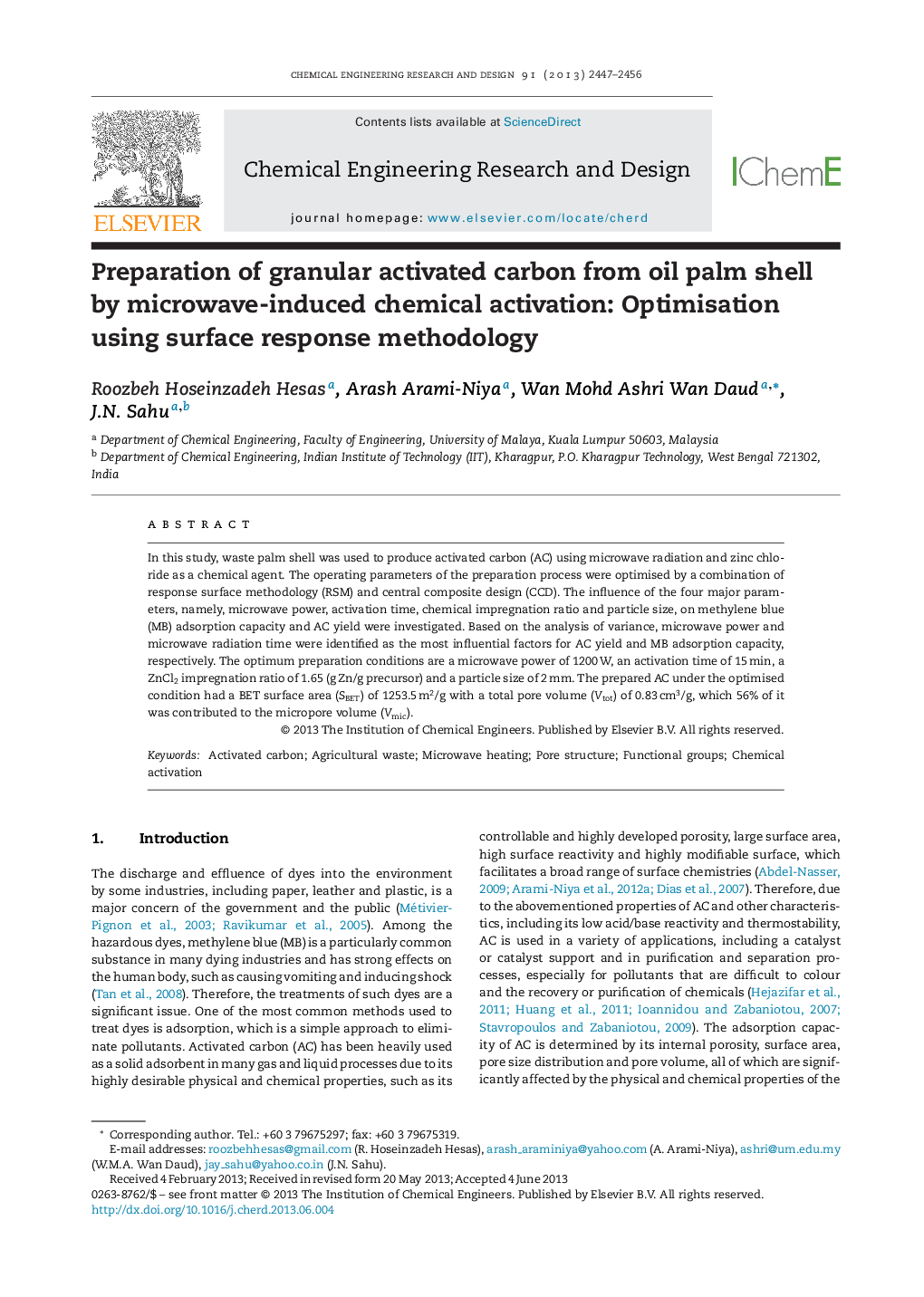 Preparation of granular activated carbon from oil palm shell by microwave-induced chemical activation: Optimisation using surface response methodology