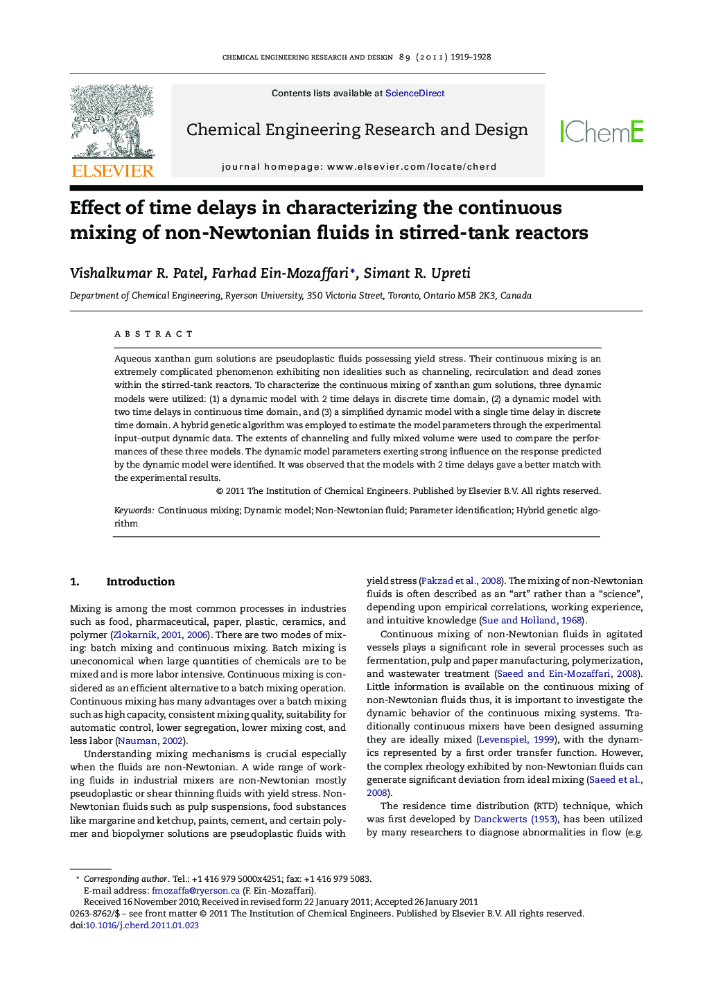 Effect of time delays in characterizing the continuous mixing of non-Newtonian fluids in stirred-tank reactors