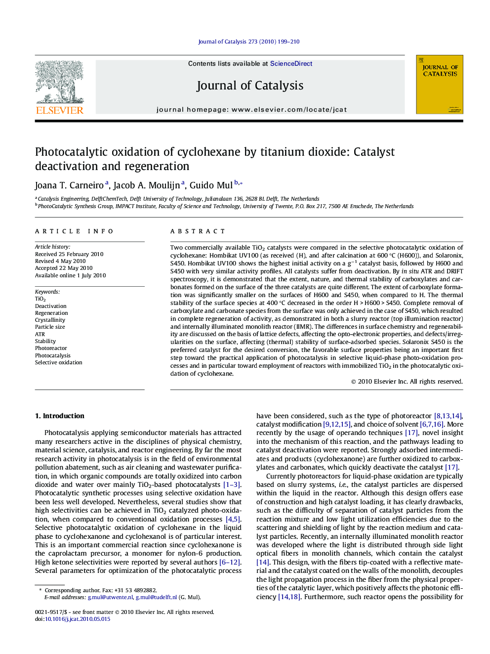 Photocatalytic oxidation of cyclohexane by titanium dioxide: Catalyst deactivation and regeneration