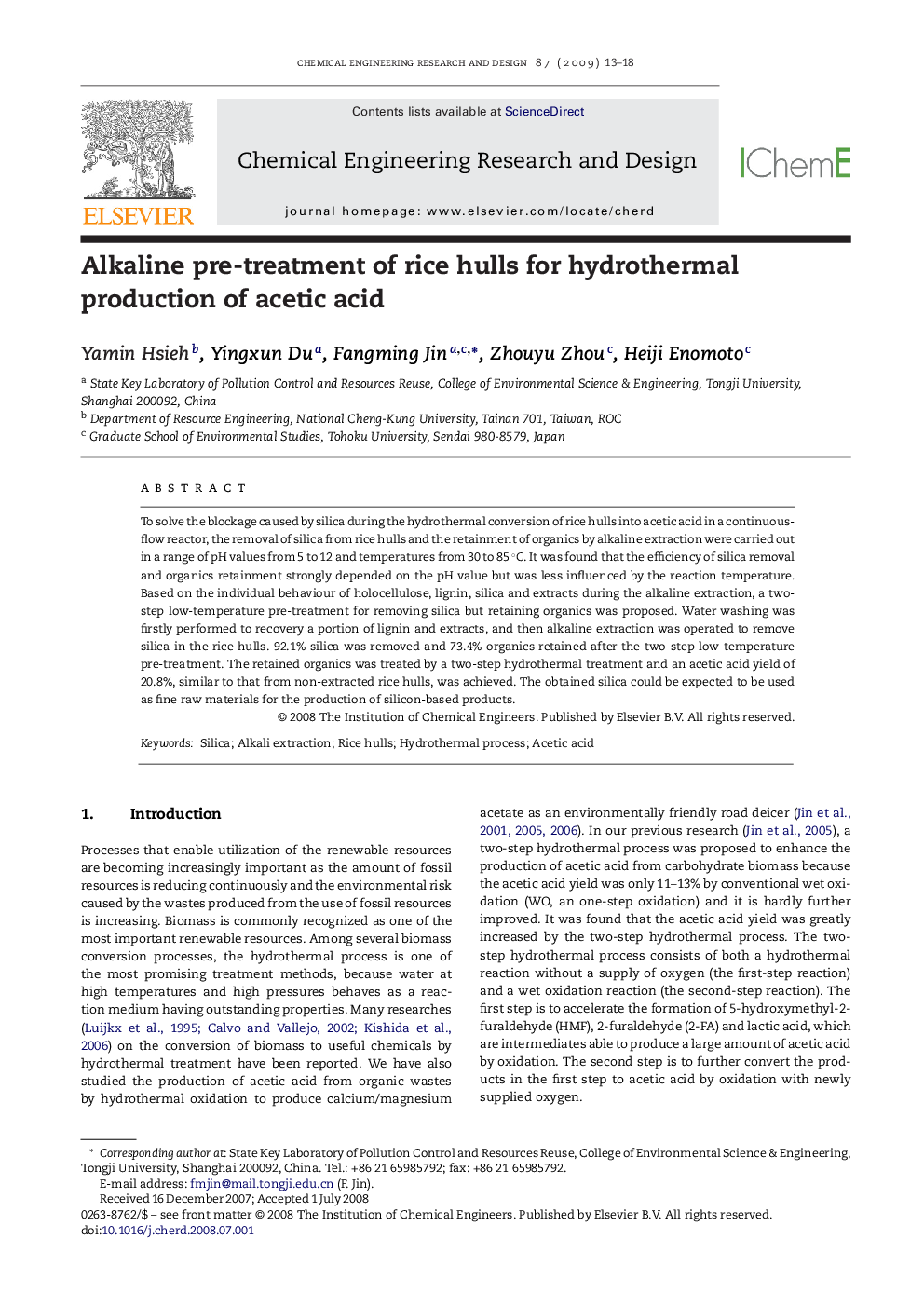 Alkaline pre-treatment of rice hulls for hydrothermal production of acetic acid