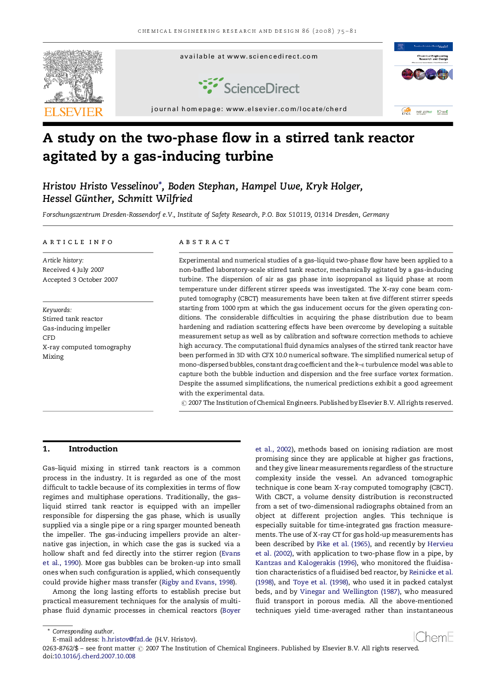 A study on the two-phase flow in a stirred tank reactor agitated by a gas-inducing turbine