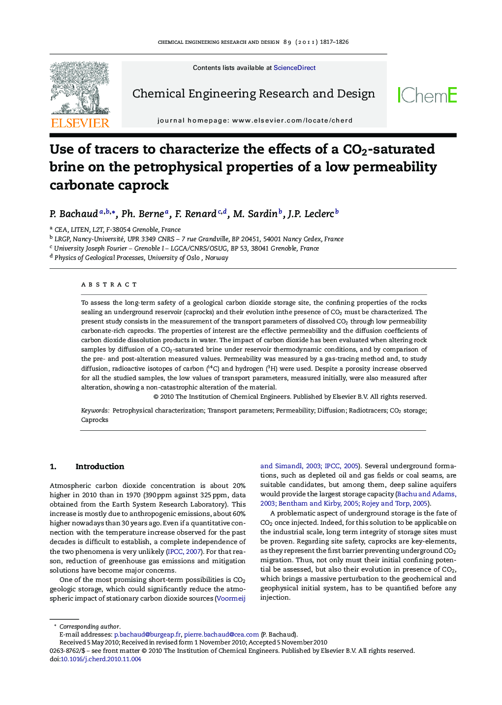 Use of tracers to characterize the effects of a CO2-saturated brine on the petrophysical properties of a low permeability carbonate caprock