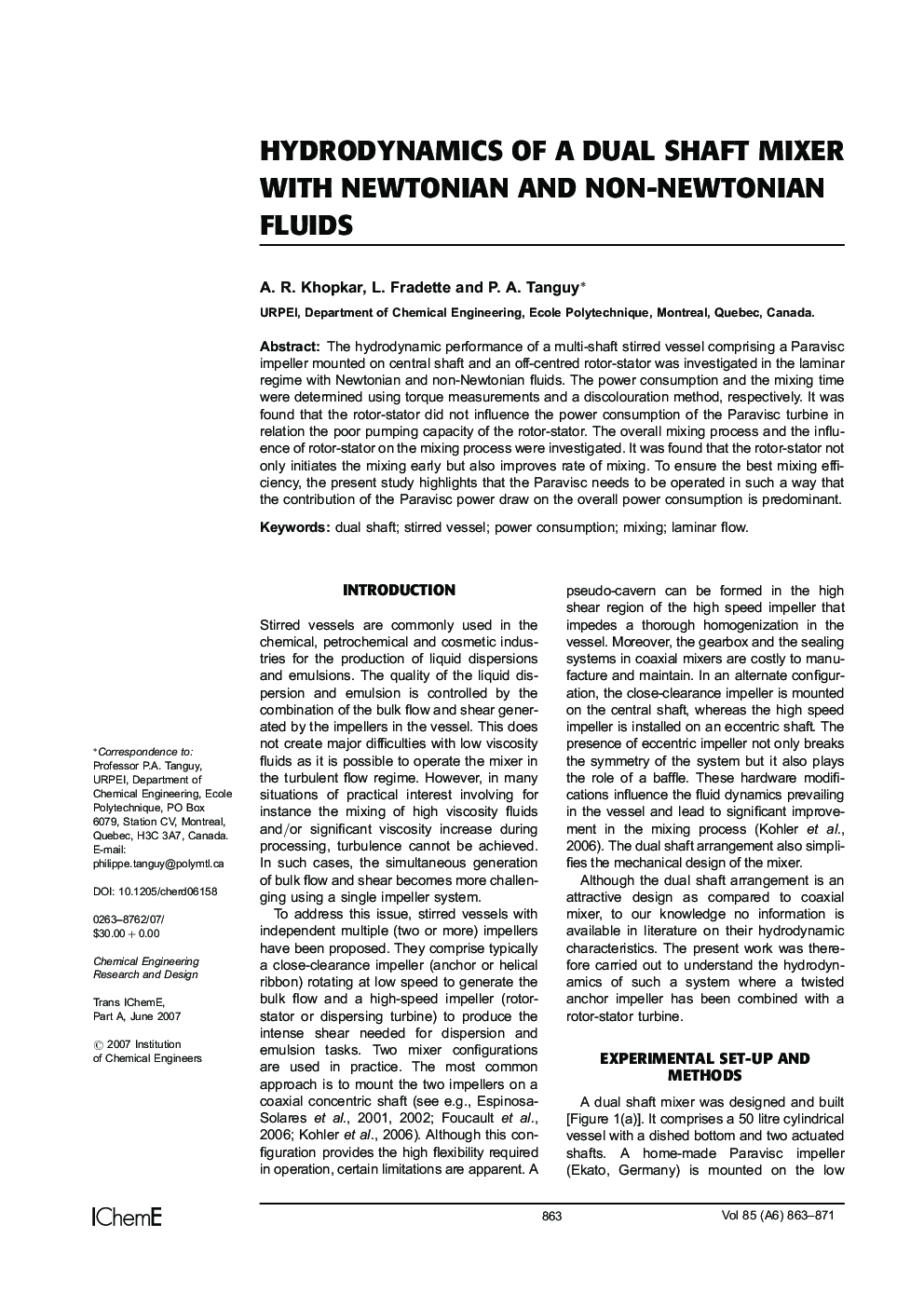 Hydrodynamics of a Dual Shaft Mixer with Newtonian and Non-Newtonian Fluids