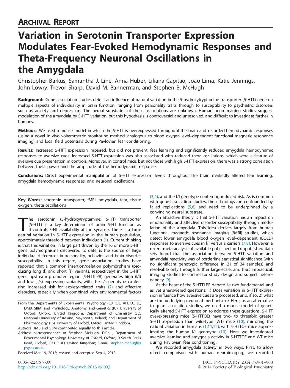 Variation in Serotonin Transporter Expression Modulates Fear-Evoked Hemodynamic Responses and Theta-Frequency Neuronal Oscillations in the Amygdala
